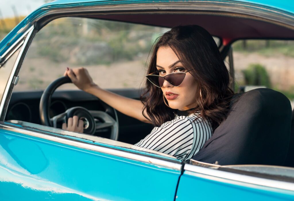 woman sitting in vehicle