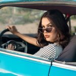 woman sitting in vehicle