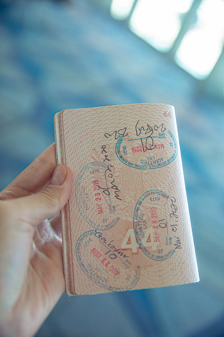 person holding an opened passport