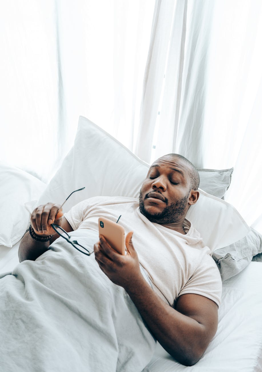 black man waking up from phone call
