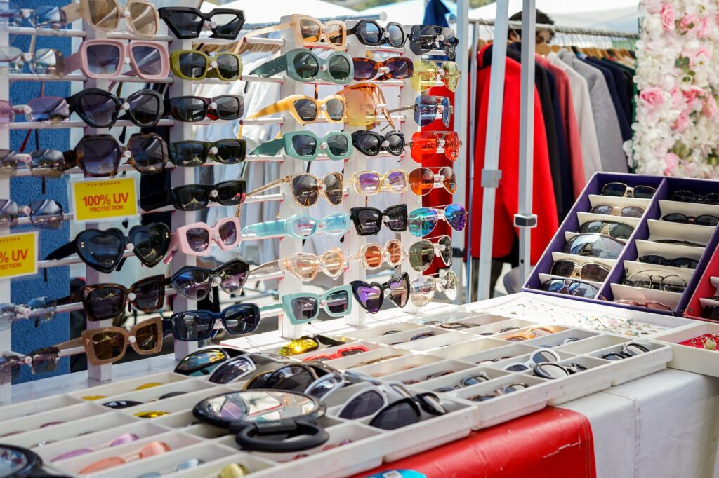 a display of sunglasses and other items on a table
