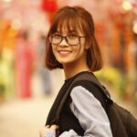 woman wearing black framed eyeglasses