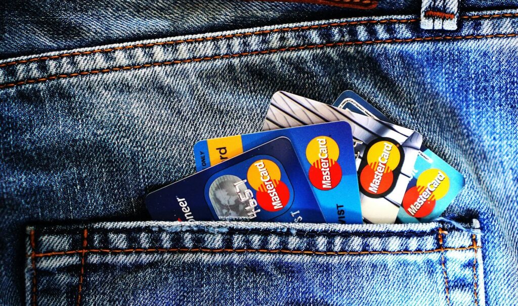 blue master card on denim pocket